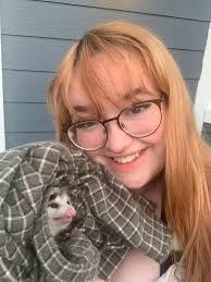 How to humanely remove an opossum from your backyard?