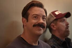 ‘Ted Lasso’ Season 4 Trailer: Jason Sudeikis’ Beloved Coach Takes On Women’s Soccer