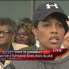 Crowd defies curfew in Baltimore neighborhood