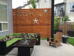 My neighbor ran a cable from my garage to the house. Cedar Patio Privacy Wall 5 4x6 Cedar Deck Boards Lag Bolted To 4x6 Pressure Treated Posts Set In Concrete O Patio Privacy Patio Privacy Wall Backyard Privacy