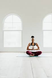 Black Lady Doing A Sukhasana Yoga Pose Premium Image By Rawpixel Com Mckinsey Yoga Poses Savasana Pose Poses