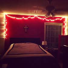 Christmas Lights In My Bedroom I Love It Especially With The Red Wall Christmas Lights Inside Christmas Lights Cool Rooms