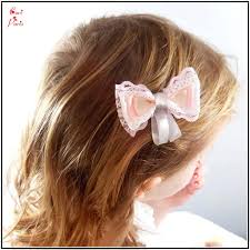 With the lovely appearance and beautiful texture, the bun tweaks towards the sides and appears like a perfect bow. Cori Paris Toddler Hairstyles With Pink Hair Clip Girl Hair Accessory