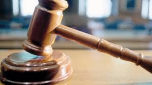 Hackerul "Guccifer", care a spart conturile de e-mail ale lui Colin Powell  şi George Bush, extrădat în SUA