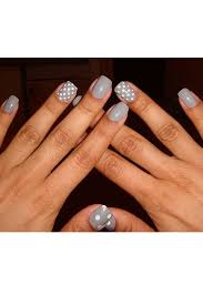 Apply white polish on the index finger. 50 Shades Of Grey Manicure