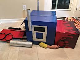 First off, i need to thank my wife for being patient with me as i transformed our apartment into an utter mess of cardboard pieces, stinking it up with burning glue and paint and long hours of me talking and obsessing over the smallest details of th… Diy Optimus Prime Transforming Costume Home Maid Simple