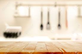 Deviantart is where art and community thrive. Wood Table Top As Kitchen Island On Blur Kitchen Background Stock Photo Picture And Royalty Free Image Image 43016898