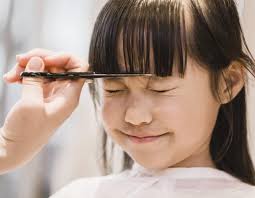 Close up of young male hairdresser cutting hair. Kids Haircuts In Singapore Best Kids Hair Salons And Where To Go For A Baby Haircut In Singapore