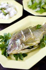 Baked Whole Tilapia Eating Richly Even When You Re Broke Whole Tilapia Recipes Whole Fish Recipes Fish Recipes Baked