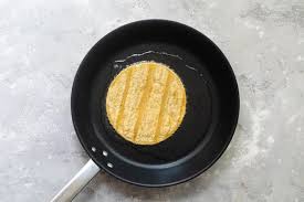 Start with corn tortillas, spread out on a foil lined cookie sheet. How To Fry Tortillas Culinary Hill