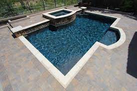 Thanks to rainbow pool plastering for our pool remodel. Stonescapes Midnight Blue With Jewelscapes Midnight Blue Glass Ca 15 Pool Plaster Pool Finishes Backyard Pool Landscaping
