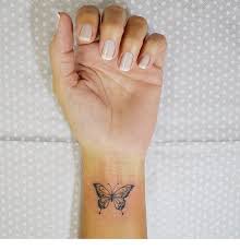 See more ideas about tattoos for daughters, tattoos, body art tattoos. Cute Butterfly Wrist Tattoo Butterfly Wrist Tattoo Tattoos Leg Tattoos