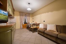 Ample rectangular seats provide a comfortable retreat after a busy day, with plenty of space for families or guests. Casa Faifer Mountain Holiday Livigno Wohnungen Livigno