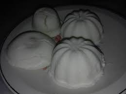 Steamed rice cake with a palm sugar filling, and coconut on the bottom. Food Lifestyle Education Parenting Diy Cararesepi