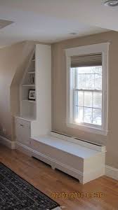 We have a similar water baseboard heat that is under our kitchen cabinet. Cover Baseboard Heaters This Might Work For Living Room By Front Window Baseboard Heater Baseboard Heater Covers Baseboard Heating