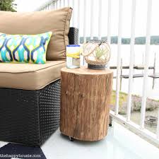 Learn how to make a diy outdoor coffee table that is perfect for all sorts of decor styles! Diy Outdoor Rolling Stump Side Table The Happy Housie