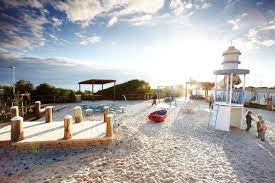 The park features a lighthouse with spiral staircase and great views across the bay, a sand castle, sand pit diggers, swings and a boat. Playgrounds Kingston City Council
