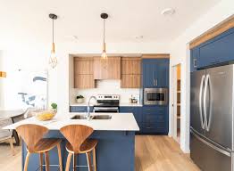 Buy more and save more on back to class essentials using promo code btcsave2021. Blue And Warm Wood House Design Kitchen Kitchen Cabinets Light Wood White Wood Kitchens