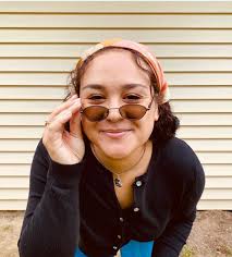 She is a go-getter ✔️ She is a goal-getter ❌ Go-getter: someone who is very  energetic, determined to be successful, and able to deal with new or  difficult situations easily.