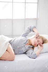 In the morning, you want to do dynamic stretches to help increase blood flow, warmth, and circulation, kimowitz explains. Young Beautiful Natural Blonde Woman Waking Up And Stretching Stock Photo Picture And Royalty Free Image Image 48450712