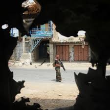 An afghan national army soldier surveying atop a humvee; A9f7c 4jntpym