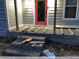Covering An Existing Concrete Porch With Wood Part 1 Addicted 2 Decorating Concrete Porch Wood Front Porch Concrete Patio Makeover