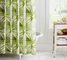white bathroom and green shower curtain