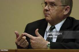 Sarasota County Sheriff fingerprint examiner William Dunker talks... News  Photo