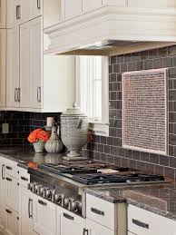 Along with protecting the walls behind your stove, our exclusive collection of kitchen backsplash tiles helps you bring your creative kitchen backsplash ideas to life. Smoky Gray Subway Tile In White Kitchen Hgtv