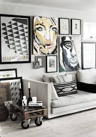 Gallery Wall With Large And Small Abstract Paintings Mainly Black And White Decor Wall Art Living Room Living Room Decor