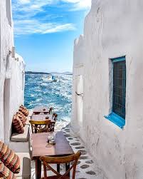 Grab A Table At Kastro S Restaurant Bar A Mykonos Institution And While You Enjoy Grilled Calamari Washed Travel And Leisure Greece Travel Places To Travel