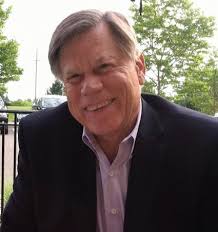 Track standout Naughton running to Butler