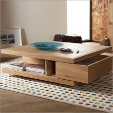 Coffee tables can use various materials, but wood, glass and metal are the most common. Ethos Oak Collection Coffee Table