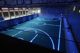 You can put a permanent basketball court just about anywhere you would like. Futuristic Basketball Court Made In Germany Glass Floor And Illuminated Marking Lines In 2021 Futuristic Gym Indoor Basketball Court Interior Architect