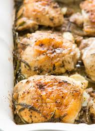 Herb Roasted Chicken Thighs With Potatoes Recipe Simplyrecipes Com Recipe Chicken Thigh Recipes Herb Roasted Chicken Roasted Chicken Thighs