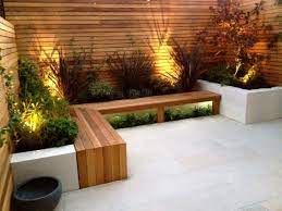 Downlighting stone veneer casts craggy shadows which give a sense of depth to this outdoor bar. 15 Garden Lighting Ideas You Can Copy This Summer Homify