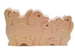 It also keeps their teeth clean and makes their jaws strong. Wooden Dog Puzzle Kids Toy Making Wooden Toys Handmade Wooden Toys Wooden Reindeer