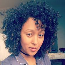 Does Tia Mowry look like the Mona Lisa? ETA: Tamera too!!!