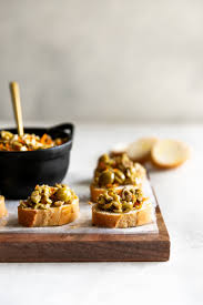 A Simple Yet Irresistible Appetizer Made With Tart Briny Olives Capers Fresh Garlic Pepper And Olive Oil Then Easy Appetizer Recipes Appetizers Easy Food