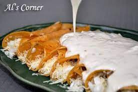They are filled with a mix of roasted vegetables and beans, and covered in a flavorful and rich sour cream sauce. Panchos Sour Cream Enchiladas For Years I Been Trying To Copy The Flavor And Style Of Thier Ench Sour Cream Enchiladas Enchilada Recipes Mexican Food Recipes