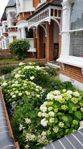 Many trees come in petite packages so they'll fit in small backyards and tiny side lots. Tiny Front Garden American Traditional Garden London By Fenton Roberts Garden Design Houzz