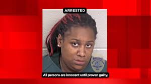 A corrections officer has been arrested for allegedly stealing from an  inmate.