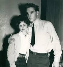 When 14-year-old Priscilla told 24-year-old Elvis Presley that she was a  freshman in high school when they met in 1959, he responded "Why, you're  just a baby." They would soon begin dating,