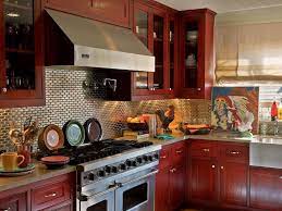 Here, a very traditional kitchen is given a surprisingly fresh update with the use of the deep blue color on shaker cabinets. Red Kitchen Cabinets Pictures Ideas Tips From Hgtv Hgtv