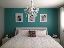 Teal Bedroom Wall Color Balanced With White Furniture Bedding Set And Chandelier Teal Bedroom Decor Bedroom Wall Colors Teal Bedroom Walls