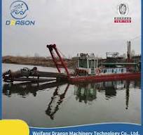 Dredge à aspiration avec tête de coupe à tarière pour le ...