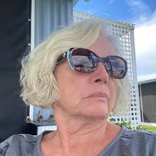 Koda disappeared into the walk-in closet an hour ago, at about the same  time as the birds disappeared from the edge of the pond and we received a  tornado warning here, in