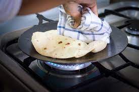 How To Make The Everyday Indian Flatbread Roti Chapati Indian Food Recipes Indian Cooking Traditional Indian Food