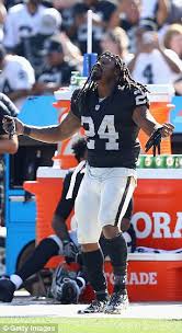 • raiders' marshawn lynch sits during national anthem before preseason game. Raiders Marshawn Lynch Thrills Fans With Celebratory Dance Daily Mail Online