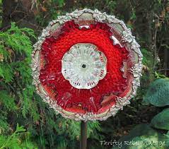 How to make glass garden flowers made from recycled glass dishes and plates. How To Make A Garden Art Dish Flower Color Me Thrifty